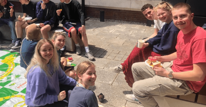 students enjoy giant board games at wellbeing event