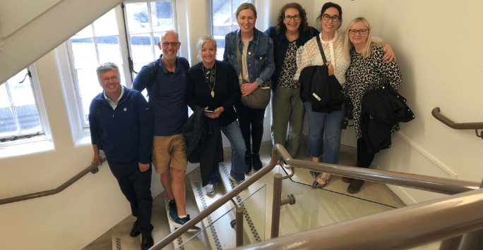 group of friends on stairwell