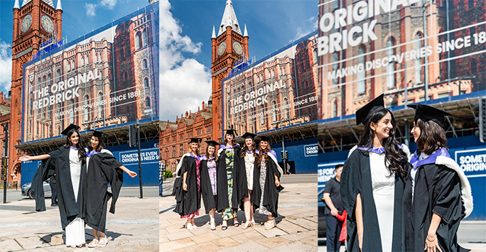 Group of students in graduation gowns by the VG&M