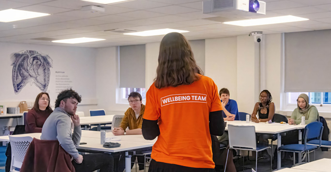 Peer Mentors in class receiving Wellbeing training