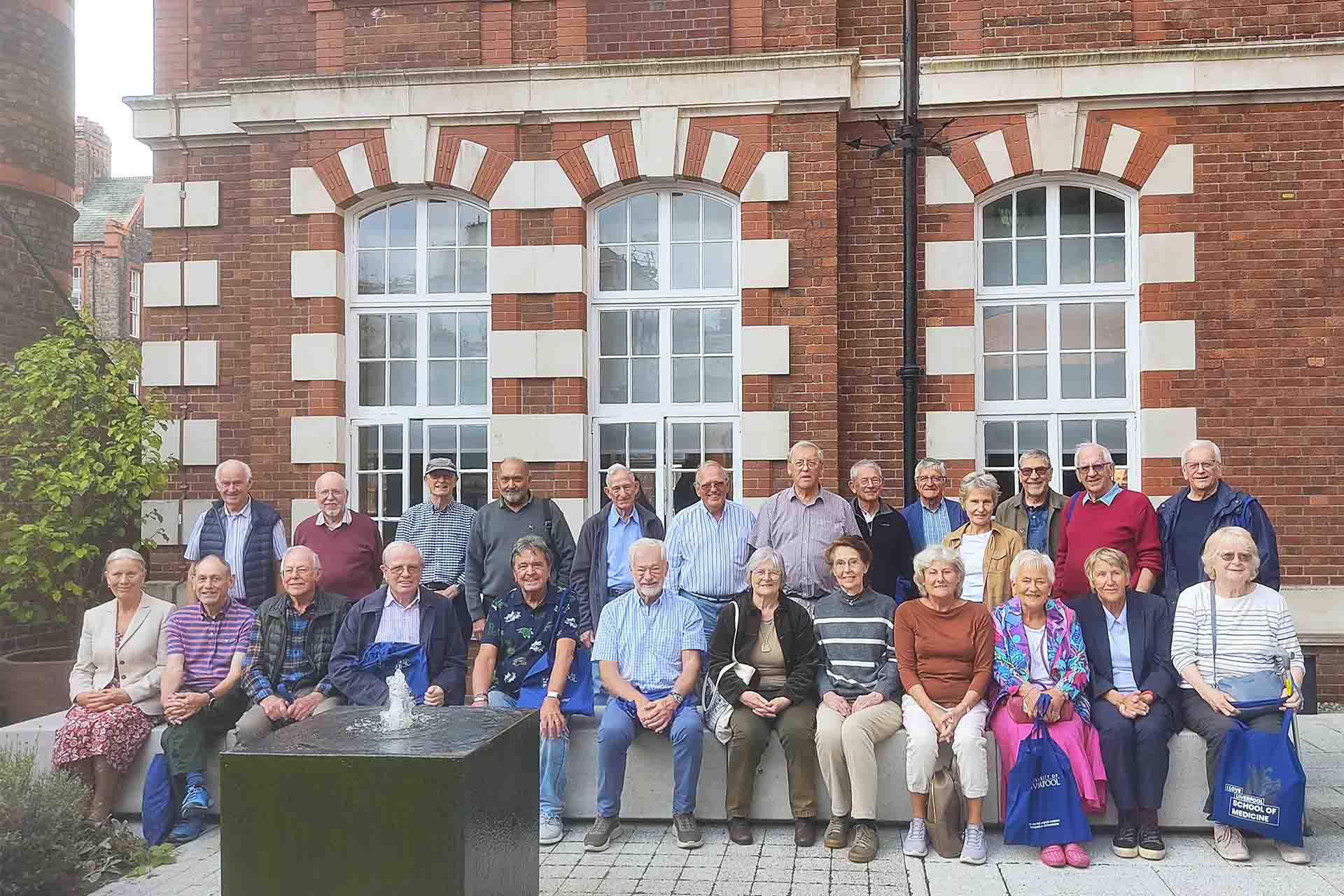 class of 1969 pose for a group photo