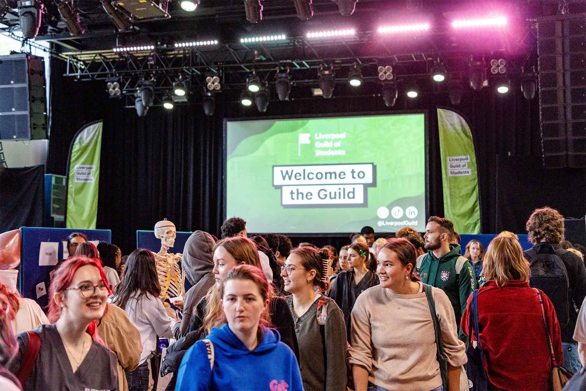 students make their way around a fair at Liverpool Guild of Students