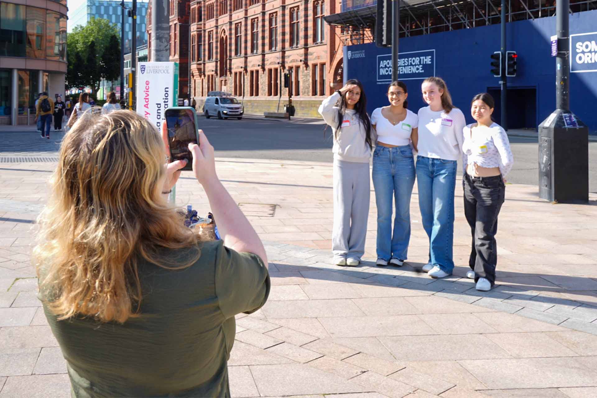 students pose for a photo on campus