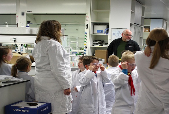 Science Jamboree kids visiting in lab coats