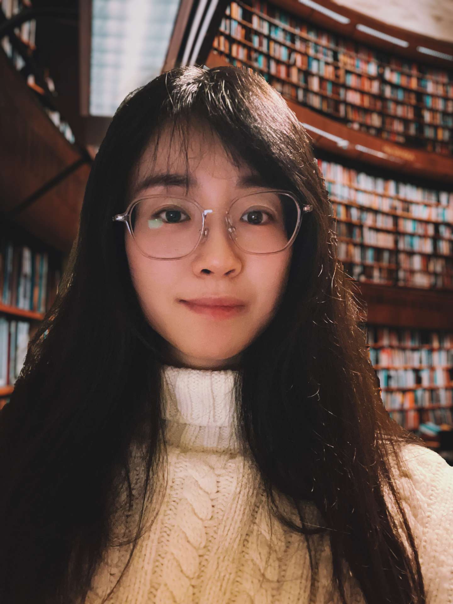 Photo of Jiang Jie in library