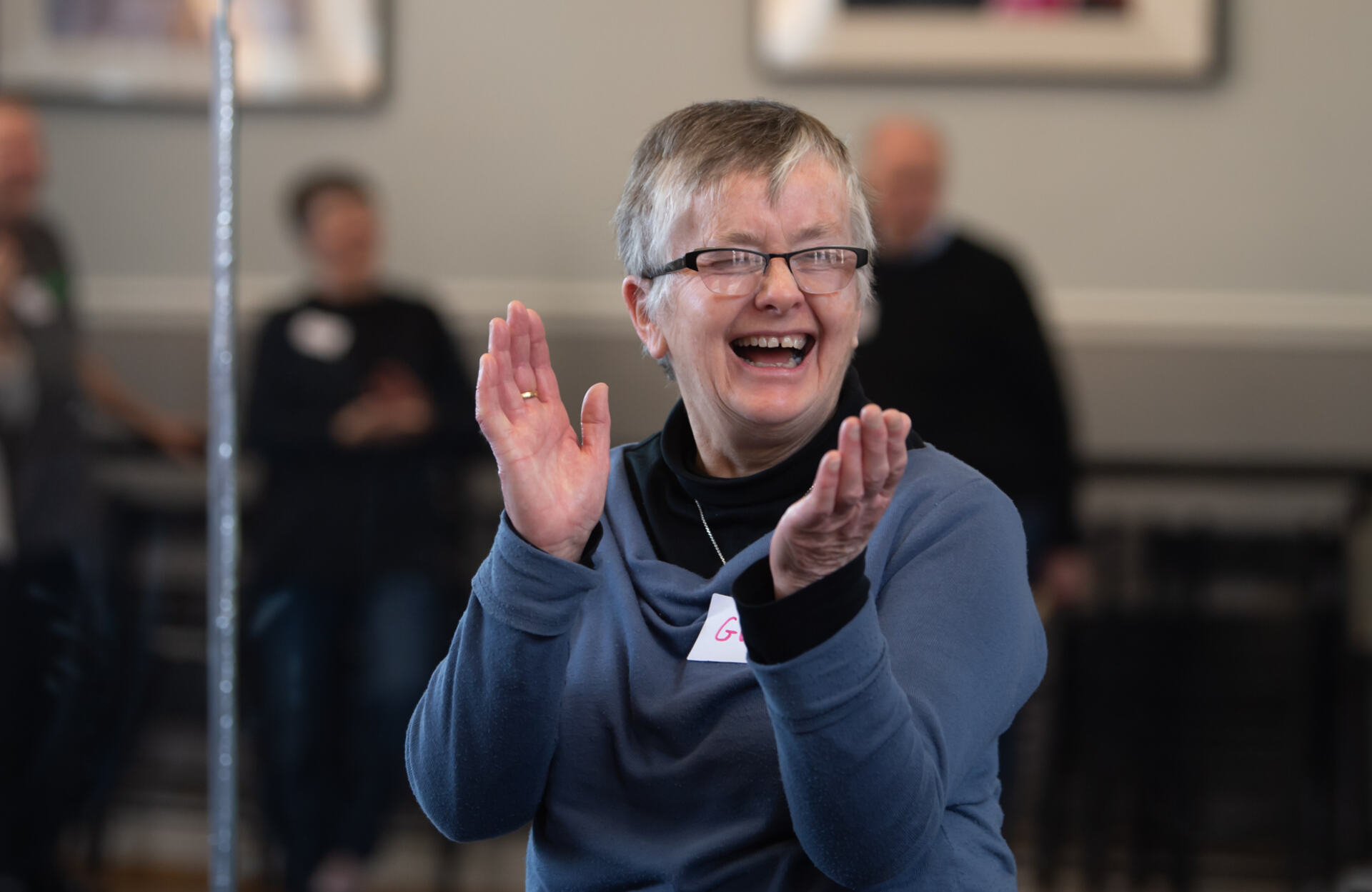 Photo of a person clapping