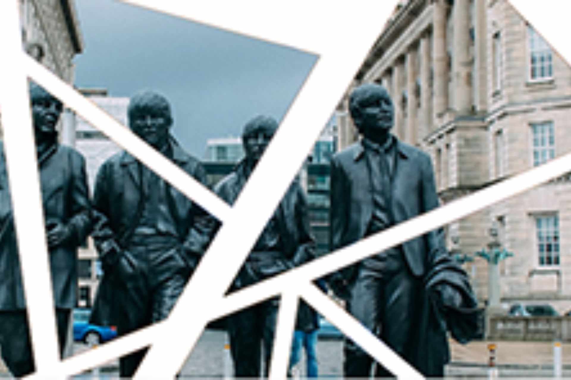 Stylised photo of a statue of the Beatles