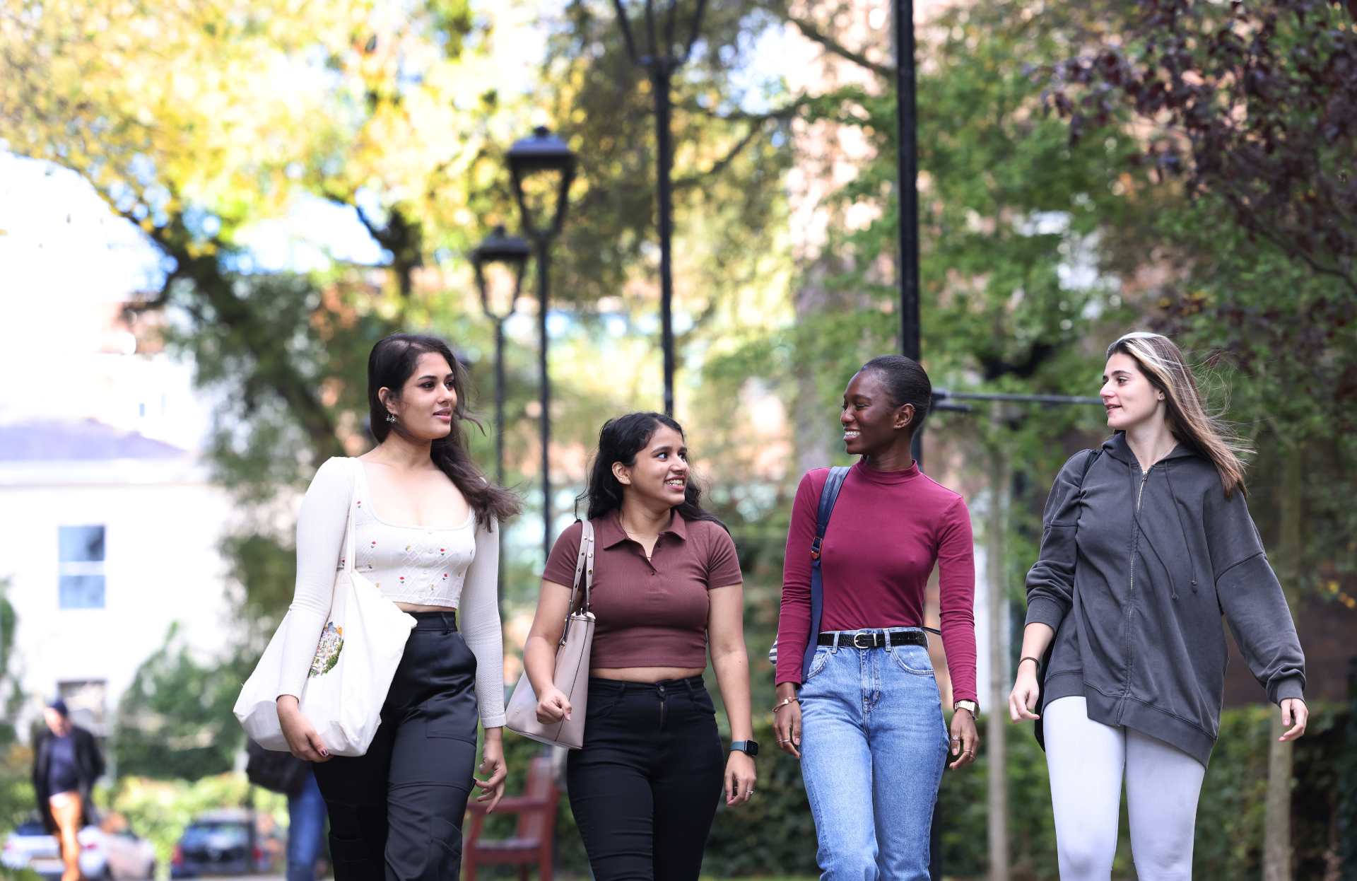 Postgraduate students walking on campus