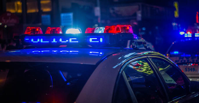 Police car in neon lights