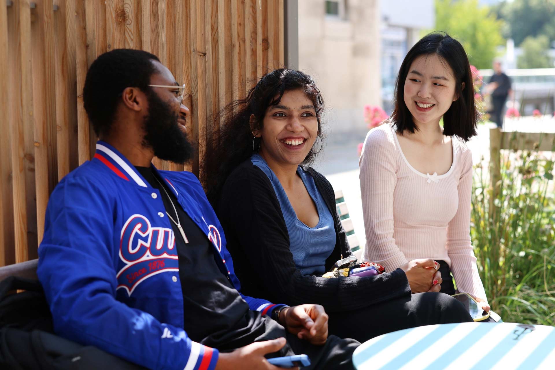 International student Kayode Afolabi and friends laughing
