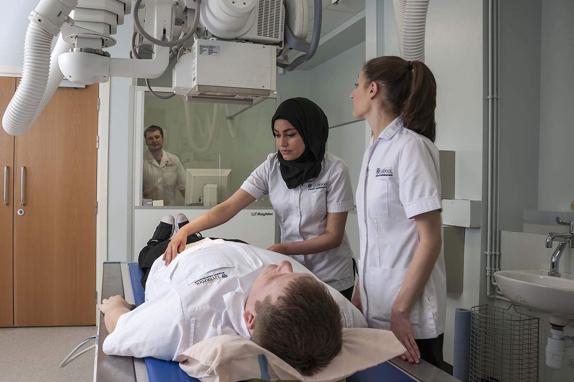 Nursing students undertaking a practical session