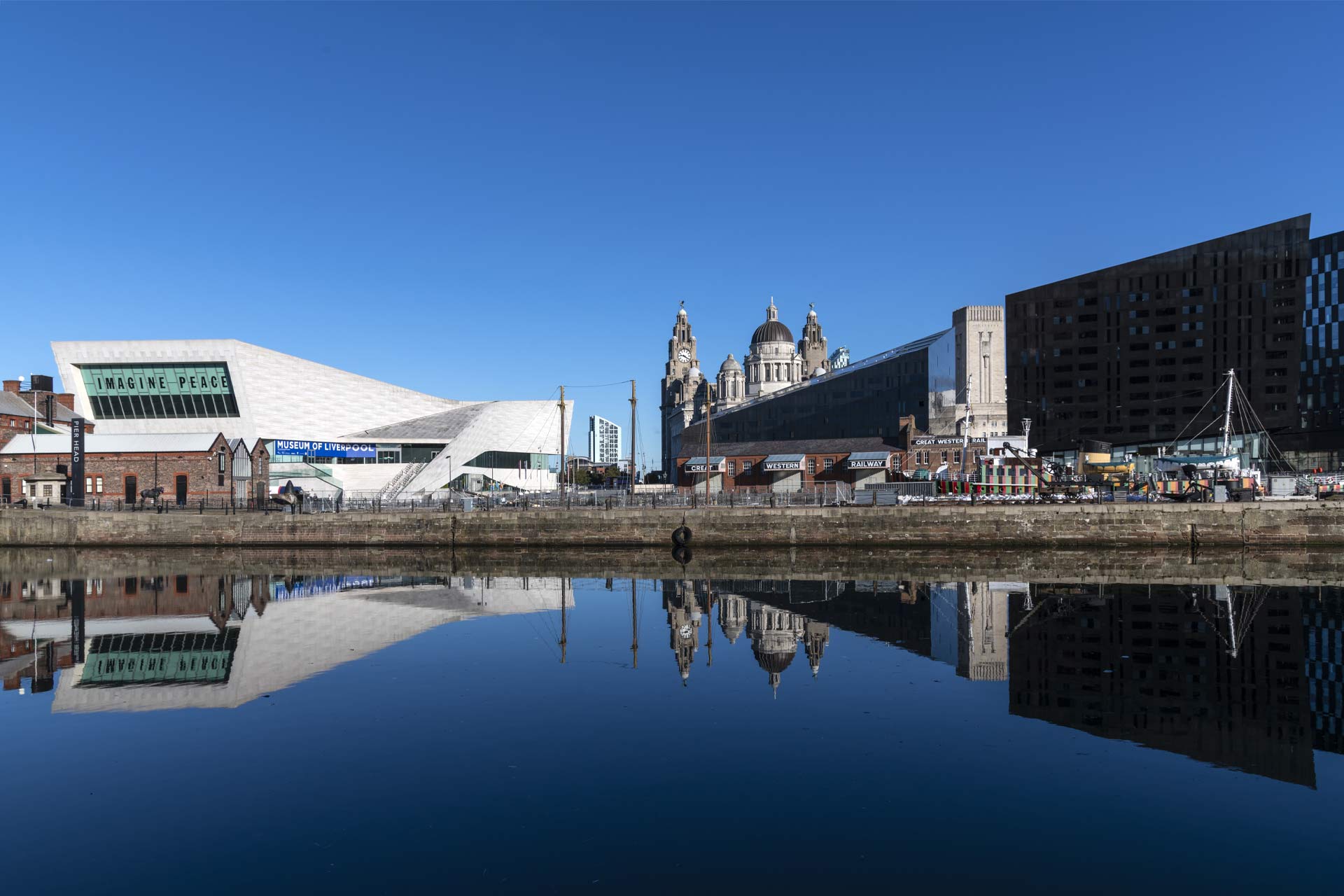 A view of the Liver buildings and Museum of Liverpool across the city's waterfront