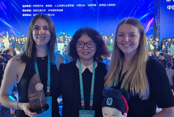 Georgia Wells, Xiaoli Meng and Elsie Clarke at the Challenge Cup competition