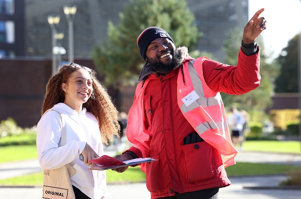 Student Advocate showing around visitor on Open Day